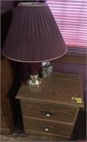 Pair of nightstands including matching lamps and