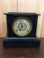 Early Mantel Clock with Gilded Bezel