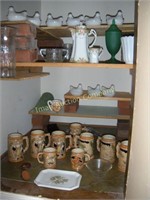 Cabinet full: hens on nests, ceramic steins, etc