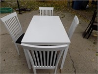 white kitchen table and  4 chairs