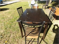 dark wood table and 4 chairs