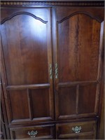 Entertainment cabinet with doors