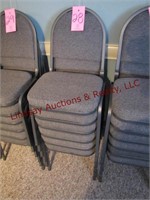 1 stack of 6 metal frame w/ cloth seat chairs