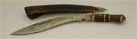 EARLY 20TH C.  KUKRI KNIFE WITH LEATHER SCABBARD
