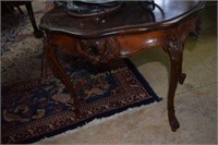 Burled Mahogany top side table w/ carved legs & sk