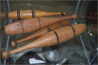 4 assorted vintage wood juggling pins