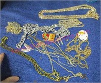 several costume jewelry chains-cross pendants-etc