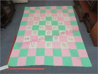 pink-green-white embroidered quilt (w/ provenance)