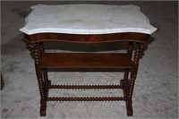 Walnut marble top spindle leg table with shelf
