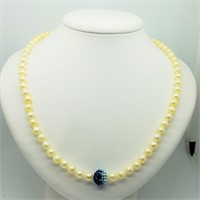 39O- sterling clasp cultured pearl necklace $400