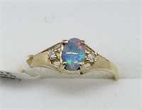31O- 10k yellow gold opal & diamond ring $600