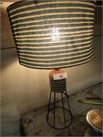Lamp with unique base and shade