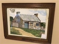 Framed watercolour of Cottage.