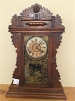 Welch antique gingerbread clock.