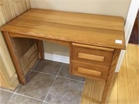 Nice little Oak desk with two drawers and writing