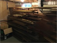 Rack of various pieces of lumber including good