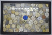 Display Case Full of Vintage Watch Faces