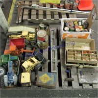 Tin cans, ford toy tractor, tackle box