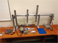 Optical lab test stand and assorted gear on top