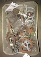 Tote full of various trailer pins, pulley, cotter