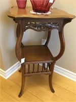 Small antique oak plant stand with lower shelf.