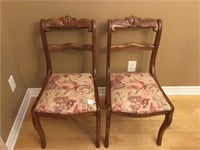 Pair of carved-back walnut dining chairs.
