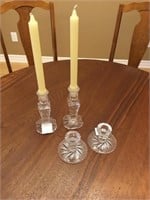 Two pair of crystal candlesticks.