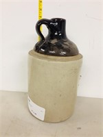 crockery jug with partial label