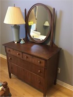 Walnut antique dresser with swing mirror.