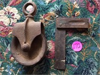 OLD IRON PULLEY AND CARPENTER SQUARE