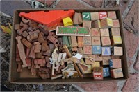 Box of Lincoln Logs, cut out animals & toy blocks