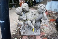 Concrete garden statue of 3 putti