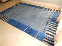 Blue area rug.