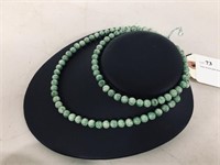 long strand jade bead necklace