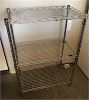 Adjustable wire rack shelving unit