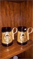 Pair of greatest curler beermugs 8 1/4 inches tall