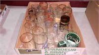 Large flat of beer mugs and glasses