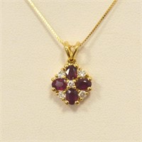 18kt yellow gold ruby and diamond pendant