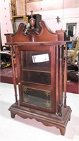 Wooden hanging curio cabinet