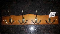 Wooden brass coat hanger