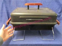 small portable gas grill (propane)