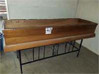 Casket with No Top on Casket Stand