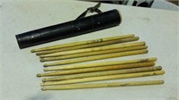 10 drumsticks in leather drumstick holder