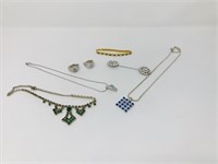 necklaces, bracelet, sweater pin, earrings