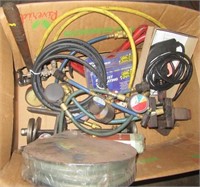 Rope light, bench vise, gas nozzles, gages with