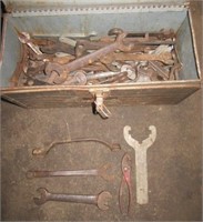 Portable metal tool box filled with a large