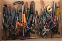 Hand tools including screwdrivers, wire cutters,