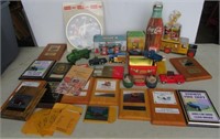 Coca-Cola collectibles including clock, tins,