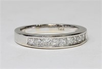 14K White gold band with nine square brilliant cut