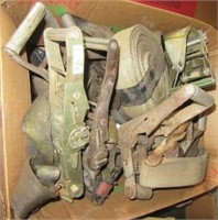 Box filled with a large quantity of tow straps.